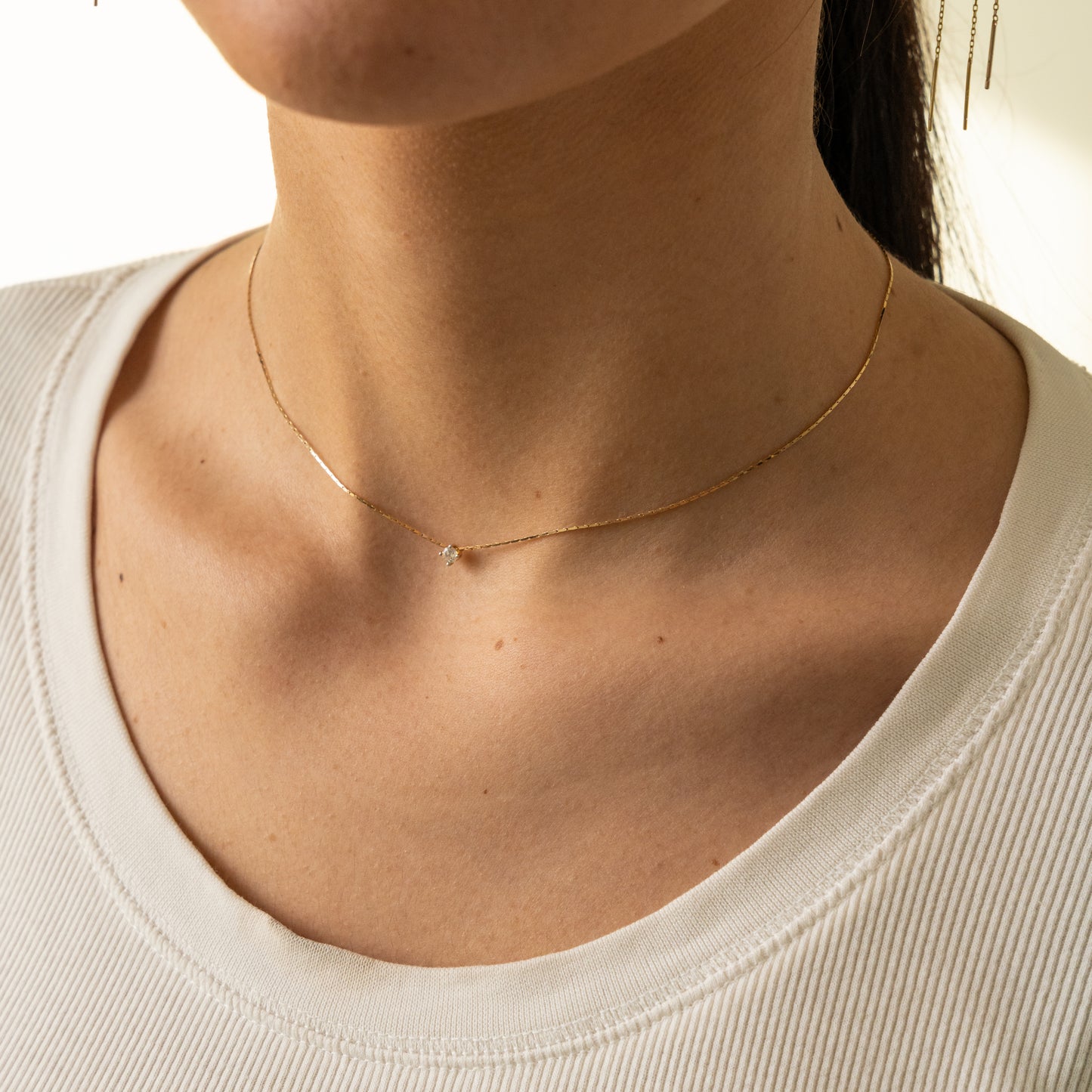 Collana punto luce sottile